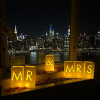 “MR & MRS” Light up Letters with Tealight Candles and Rose Petals Included. Luminary Paper Bags to be Used as Wedding Decorations for Reception or as Newlywed Gift for The Honeymoon Suite